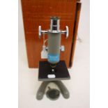 A Beck of London microscope, serial number 38996, with adjustable lens, complete with case