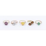 A collection of five Gems TV 9ct gold and gem set rings to include an Ethiopian opal ring claw set