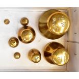 A set of Avery imperial brass weights, 2lb to ¼oz