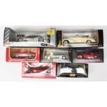 Diecast: A collection of seven boxed diecast vehicles to comprise: Maisto, Bburago and