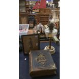 A collection of three items including a leatherbound bible, a watercolour of a 19th Century gent, an