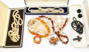A collection of costume jewellery to include a multi row fresh water pearl necklace with 9ct gold