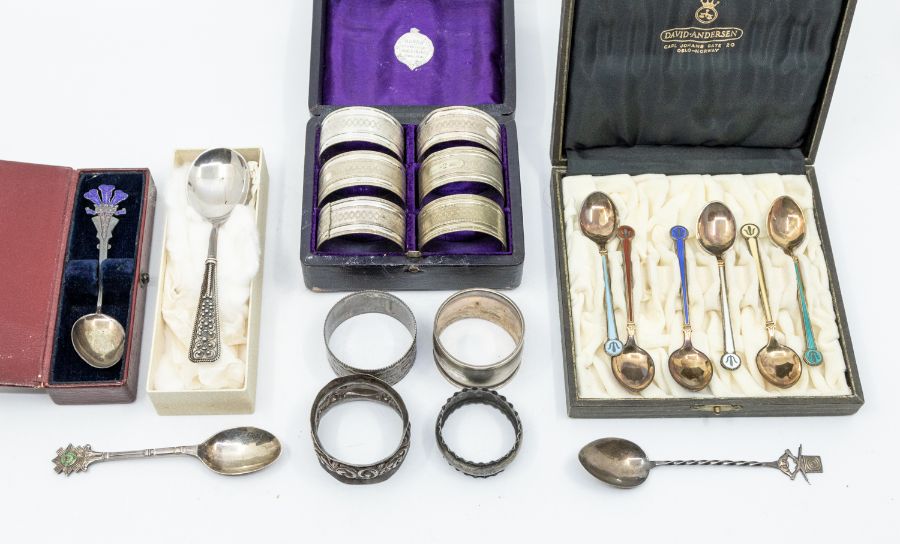A group of silver to include: A set of six Norwegian 925 silver gilt and enamel harlequin coffee