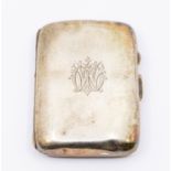 A George V plain silver monogrammed cigarette case, hallmarked by James Dixon & Sons, Sheffield,