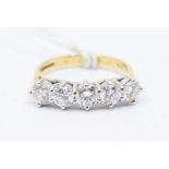 An 18ct five stone diamond ring, total diamond weight approx 1.25 carat, gross weight 4.3grams, size