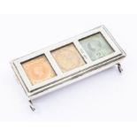 A Victorian silver triple compartment stamp box with half penny vermillion, one penny in lilac and