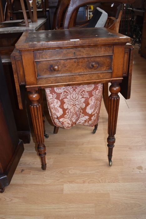 A William IV walnut drop leave sewing table, inset with tooled leather writing top, single drawer to