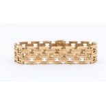 A Modernist 9ct yellow gold textured pierced bracelet, total gross weight32g, hallmarked Birmingham,