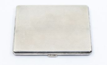 An Asprey & Co. George VI silver engine turned cigarette case, the gilt interior with inscription