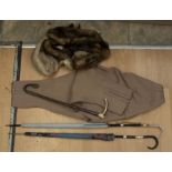 Ladies vintage fashion - two vintage umbrellas, a pair of riding jodhpurs and riding crop, mink