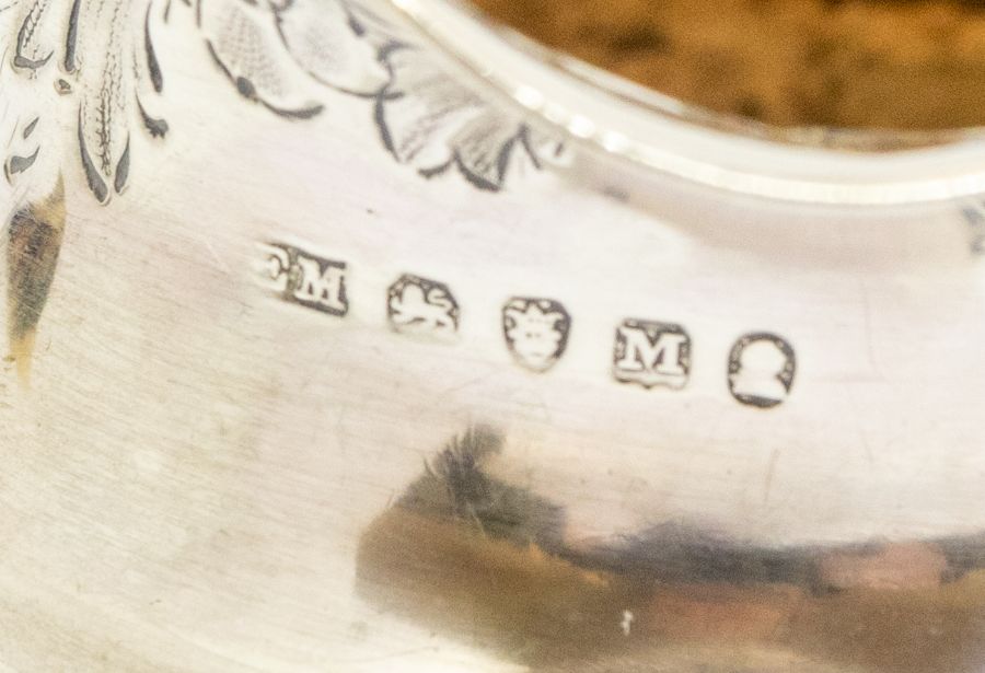 A George III silver cream jug, the body chased with foliage and scrolls, hallmarked by Edward - Image 2 of 2