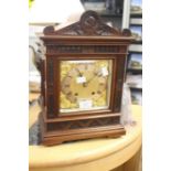 Late 19th Century mahogany mantle clock with glass panelled sides, silvered dial, Roman numerals,