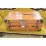 A large early 20th Century travel trunk, leather and wood for positioning on the back of a vintage