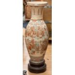 A large oversized Chinese baluster vase, on hardwood stand
