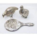 A pair of silver plated Partridges, realistically cast together with an EPNS Reynolds Angel dressing