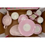 A 1950's Wedgwood pink china tea service with teapot