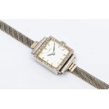 A vintage Terval ladies diamond set wristwatch, square silvered dial with baton markers, dial approx