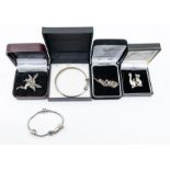 A collection of silver jewellery to include a Pandora charm bracelet with four charms to include a
