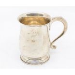 A George V baluster shaped plain silver mug, hallmarked London, 1927, 6.23 ozt (194.6 grams) -
