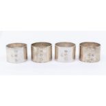 A set of four Modern plain silver napkin rings, hallmarked by Wakely & Wheeler, 1979, 2 x