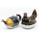 A Majolica style fish teapot, and a Staffordshire chicken (2)