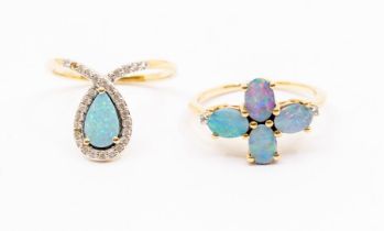 Two opal and white topaz set 9ct gold dress rings, comprising a quatrefoil set with oval opals,