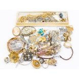 A collection of costume jewellery including silver and white metal Victorian sweetheart brooches,