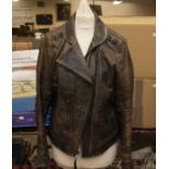 Ralph Lauren - a ladies brown leather jacket, rounded collar, diagonal zip, pockets, shoulders and