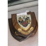 Four University wall plaques with coat of arms