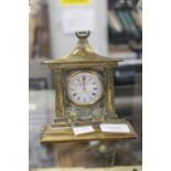 Smith & Sons London, silver pocket watch, early 20th Century on a brass mantle/desk stand watch