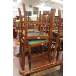 A group of 6 early 20th Century oak Arts and Crafts style chairs.   Condition: No apparent signs of