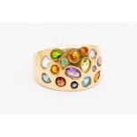 A 9ct gold and stone set ring, boule style set alternate various cuts and types of stone