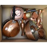 A collection of copper wares including pans and other kitchen wares