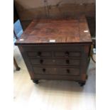 A Victorian rose mahogany commode with dummy drawers