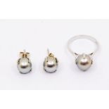 An 18ct white gold and pearl ring, comprising a grey Tahitian pearl, size P1/2  and pair of of