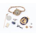 A 9ct gold watch with 9ct gold strap a/f damages, a 9ct gold horse shoe stick pin set with small