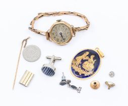 A 9ct gold watch with 9ct gold strap a/f damages, a 9ct gold horse shoe stick pin set with small