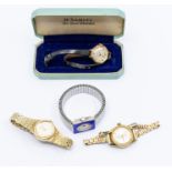A collection of ladies watches including a 9ct gold Avia on leather strap, a silver and guilloche