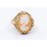 A 9ct gold Cameo ring with portrait of a Lady in textured shoulders, stamped, total gross weight 5.