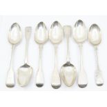 A collection of seven 19th Century fiddle pattern table spoons, all hallmarked London, circa