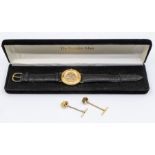 A Franklin Mint silver gilt gents watch, leather strap and two gold plated collar studs