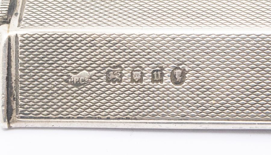 An Art Deco silver cased Parker Beacon diamond shaped lighter, stamped to base with Registration - Image 2 of 4