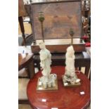 Two marble figure Chinese lamps on gilt bases
