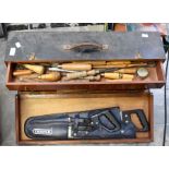 Coach carpenters tool box containing wooden handled tools, wooden plains and other precise coach