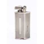 An Art Deco silver cased Parker Beacon diamond shaped lighter, stamped to base with Registration