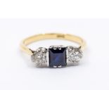 A sapphire and diamond18ct gold  ring, comprising a claw set square sapphire approx. 4mm, with