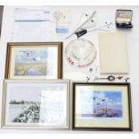 A collection of assorted Concorde memorabilia to include: prints, ashtray, cufflinks, two models