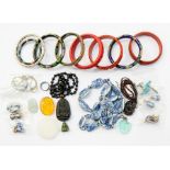 A collection of oriental costume jewellery to include enamel bangles, blue and white ceramic bead