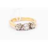 ***WITHDRAWN*** A three stone diamond and 18ct gold ring, comprising three old cut diamonds with a