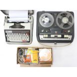 A cased Brother Typewriter, together with a cased Phillips Reel-to-Reel tape recorder with